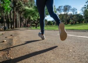 feet of person running