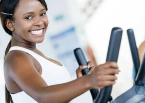 woman on an elliptical trainer